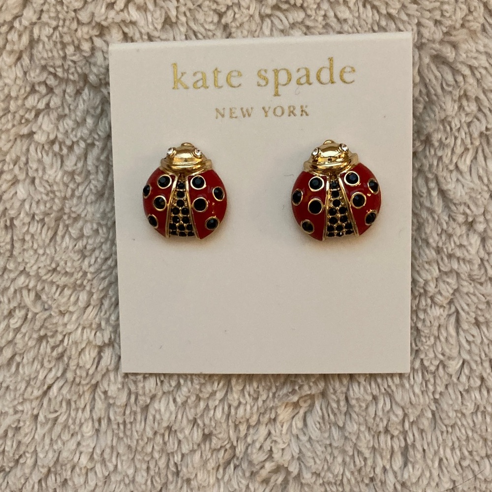 NWT- Kate Spade ladybug earrings with jewelry bag.